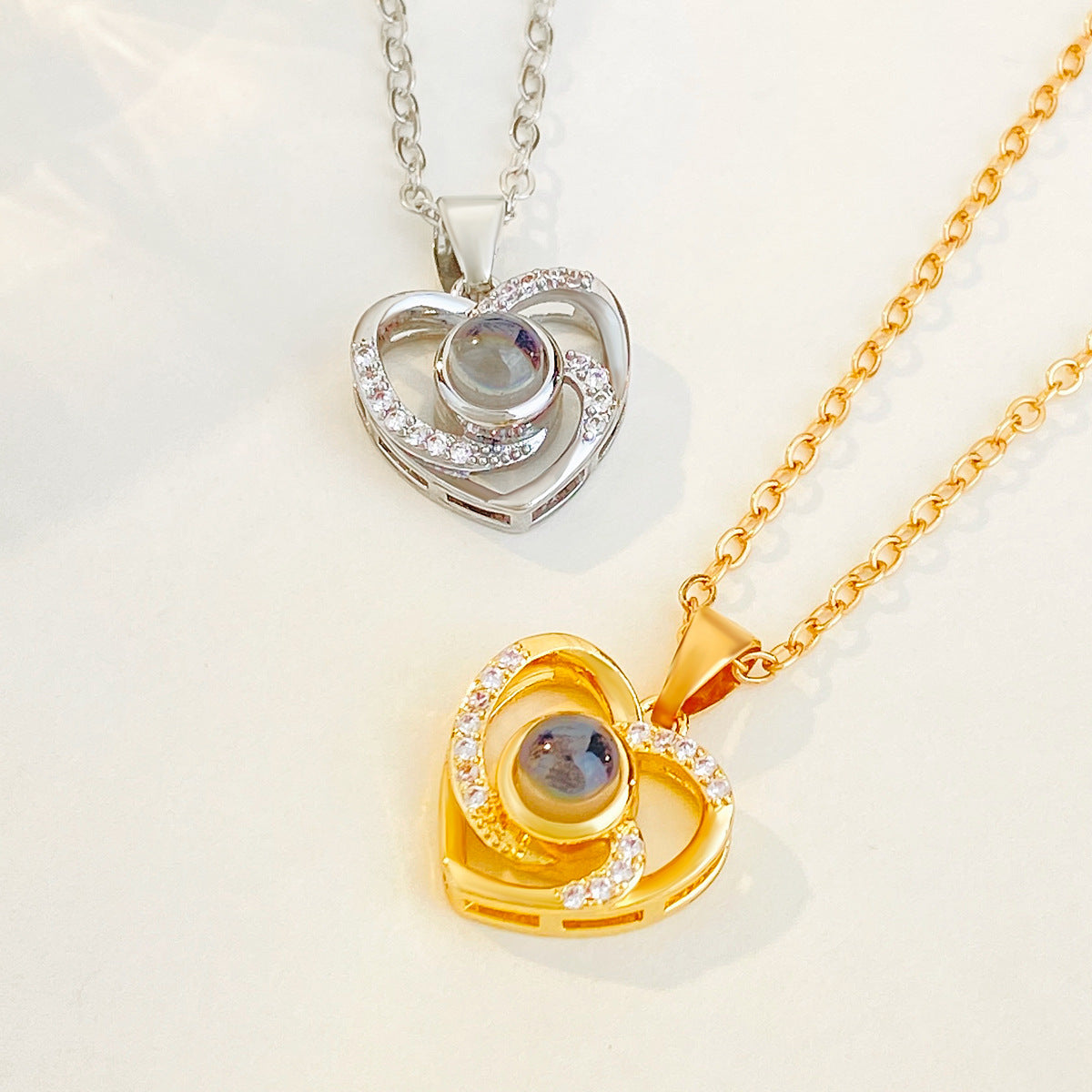 Diamond studded heart-shaped projection necklace