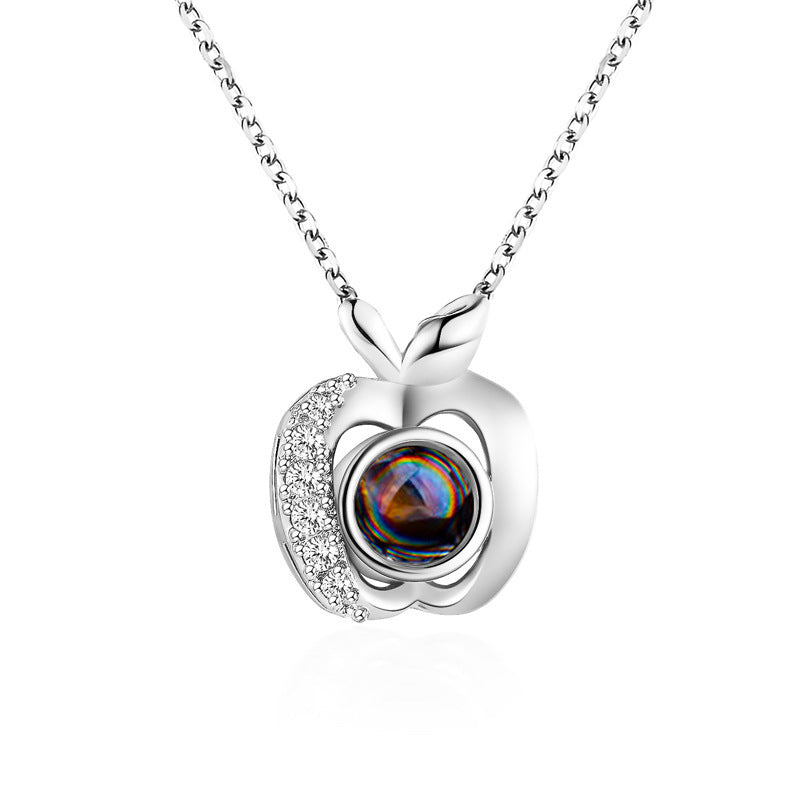 Diamond studded heart-shaped projection necklace