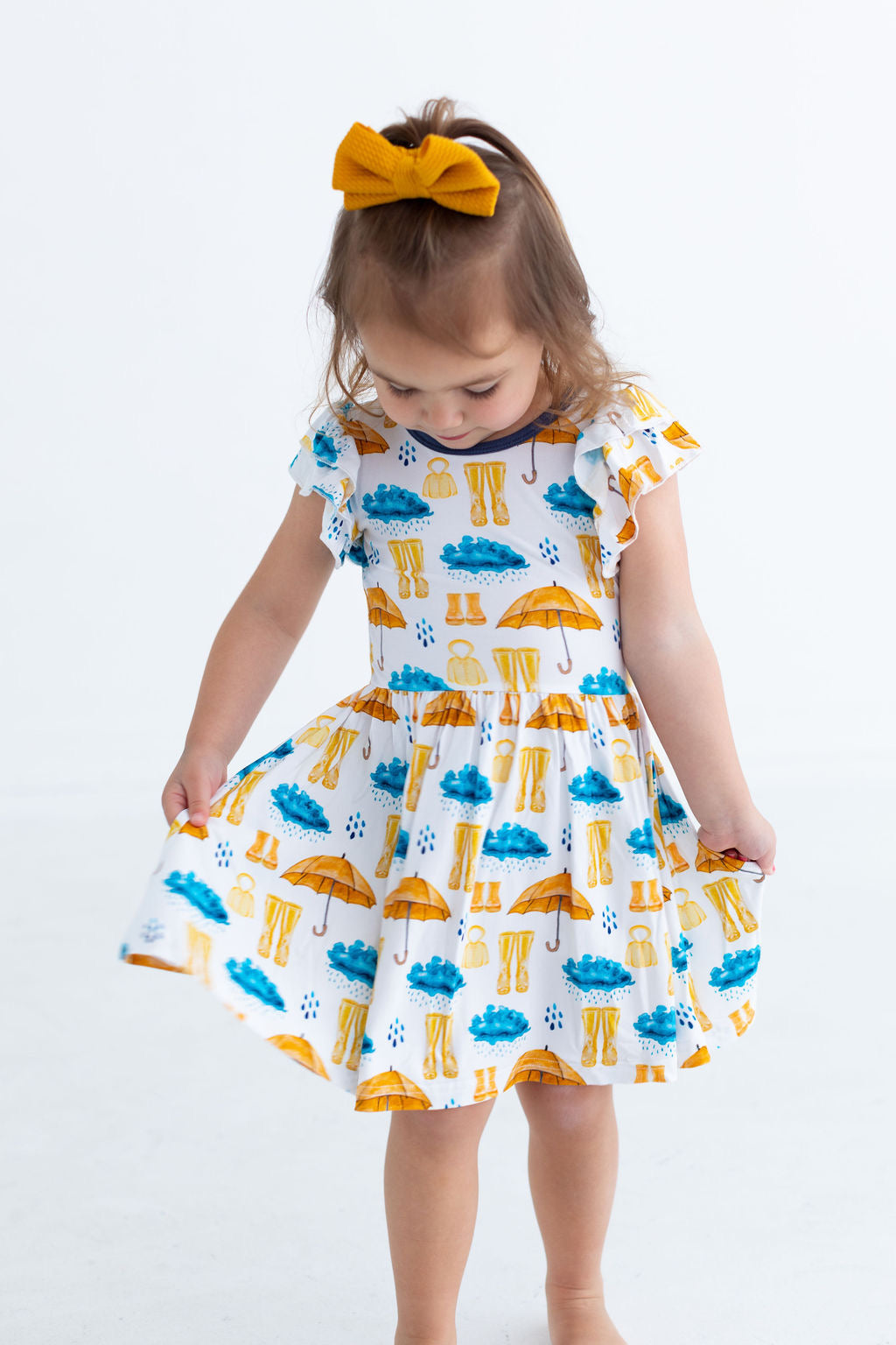 Flutter Sleeve Twirl Dress - Rainy Days